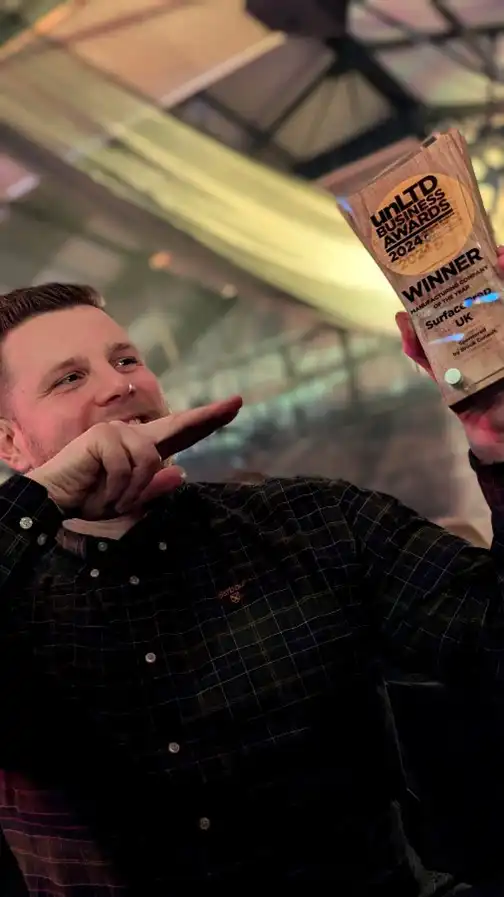 Liam Davis, BDM at SurfacePrep, holding the unLTD Business Winner Award Liam Davis, BDM at SurfacePrep, holding the unLTD Business Winner Award