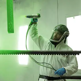 Man spray painting sign
