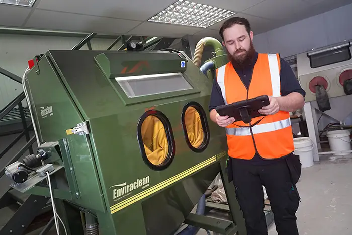 Inspecting a blast cabinet